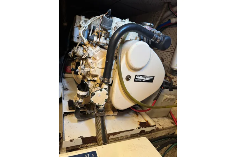 Slide: The Image of 1978 CHB 35 engine room featuring Northern Lights generator. - 42