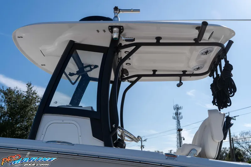 Slide: The Image of 2025 Sea Hunt Gamefish 25 boat with T-top and modern design features. - 17