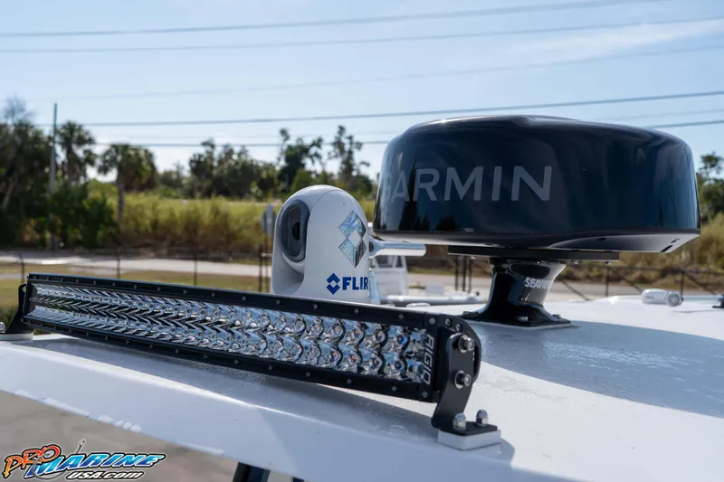 Slide: The Image of 2025 Sea Hunt Gamefish 25 boat with Garmin radar and FLIR camera on deck. - 31