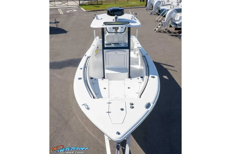 Slide: The Image of 2025 Sea Hunt Gamefish 25 boat, aerial view, docked on pavement. - 38