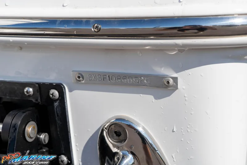 Slide: The Image of 2025 Sea Hunt Gamefish 25 boat identification plate with water droplets. - 7
