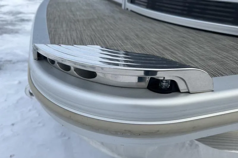 Slide: The Image of 2021 Bennington 23 LSB boat detail with sleek metallic finish and textured flooring. - 17