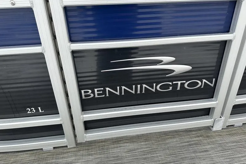 Slide: The Image of 2021 Bennington 23 LSB pontoon boat side view with logo and model name. - 21