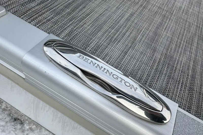 Slide: The Image of Close-up of 2021 Bennington 23 LSB boat cleat on textured deck surface. - 9