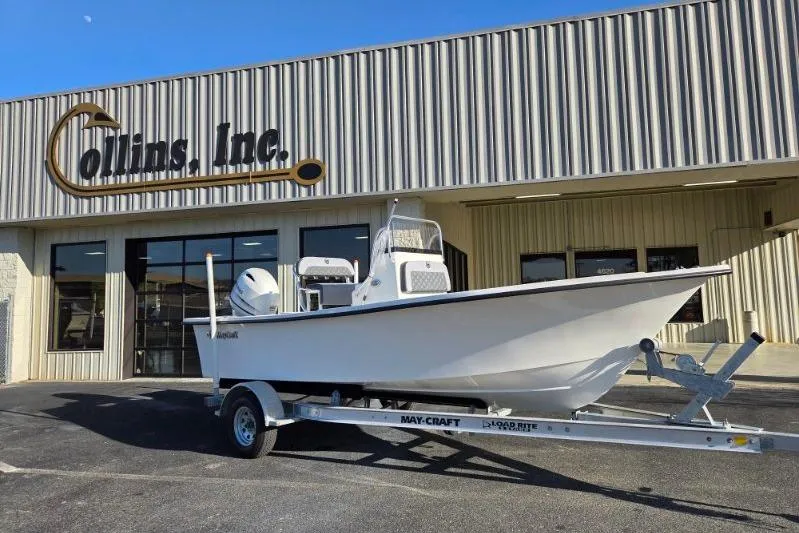 The Image of 2026 May-Craft 182 Center Console boat on trailer outside Collins Inc. building. - 0