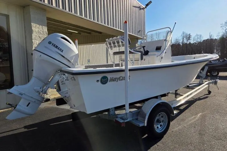 Slide: The Image of 2026 May-Craft 182 Center Console boat with Yamaha engine on trailer. - 2