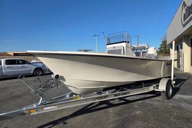 Slide: The Image of 2026 May-Craft 182 Center Console boat on trailer, parked outdoors. - 6