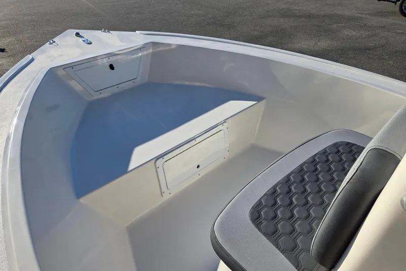 Slide: The Image of 2026 May-Craft 182 Center Console boat interior with seating and storage compartments. - 7