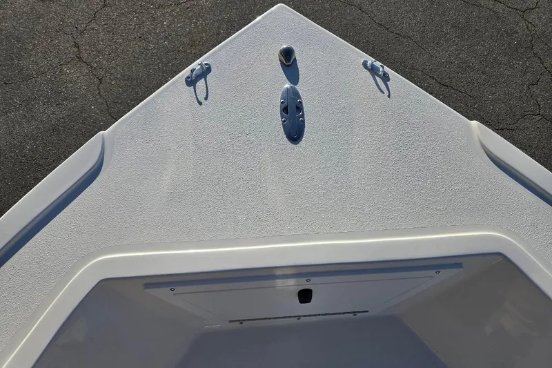 Slide: The Image of 2026 May-Craft 182 Center Console boat bow with cleats and textured surface. - 8