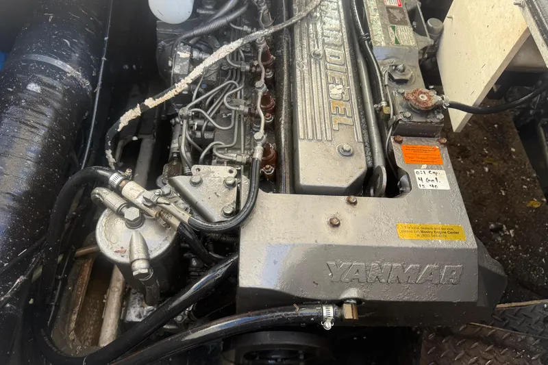 Slide: The Image of Engine of a 2005 Regal Commodore 3880 boat, featuring a Yanmar diesel engine. - 20