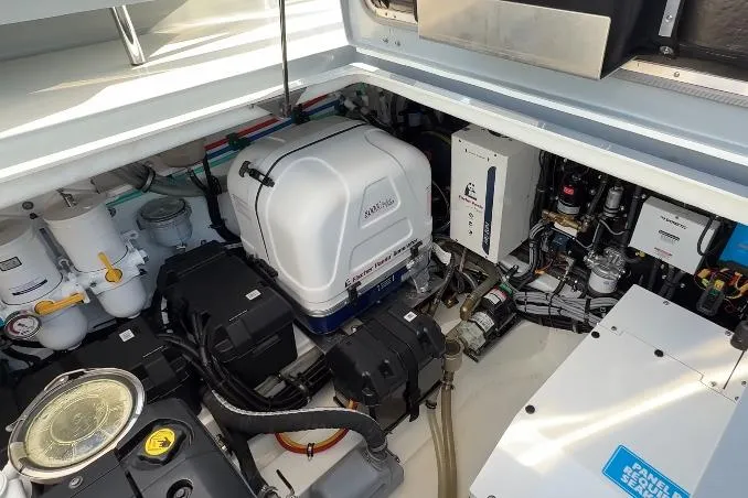 Slide: The Image of Engine compartment of 2025 Targa 37 boat, showcasing advanced mechanical systems and components. - 46