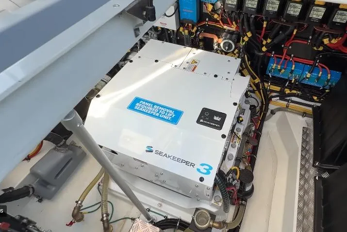 Slide: The Image of Engine compartment of 2025 Targa 37 featuring Seakeeper 3 stabilization system. - 48