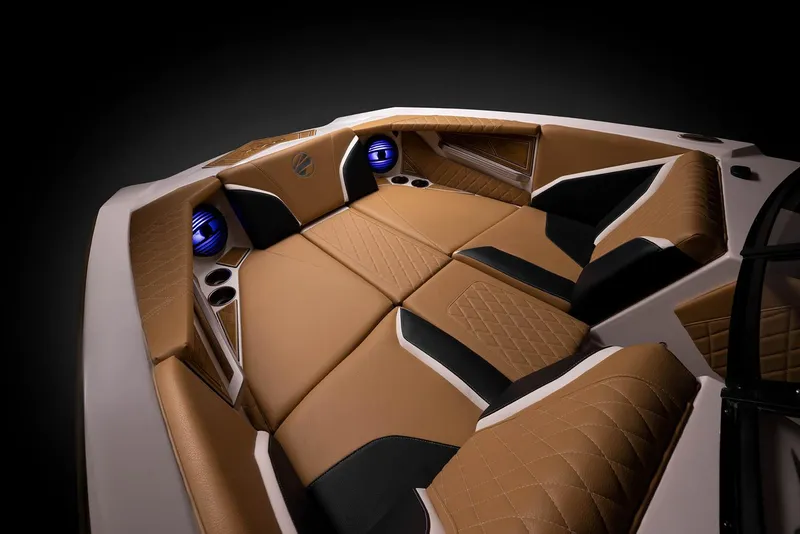 Slide: The Image of Manufacturer Provided Image: 2023 Tigé 24RZX boat interior with luxurious brown and black seating. - 16