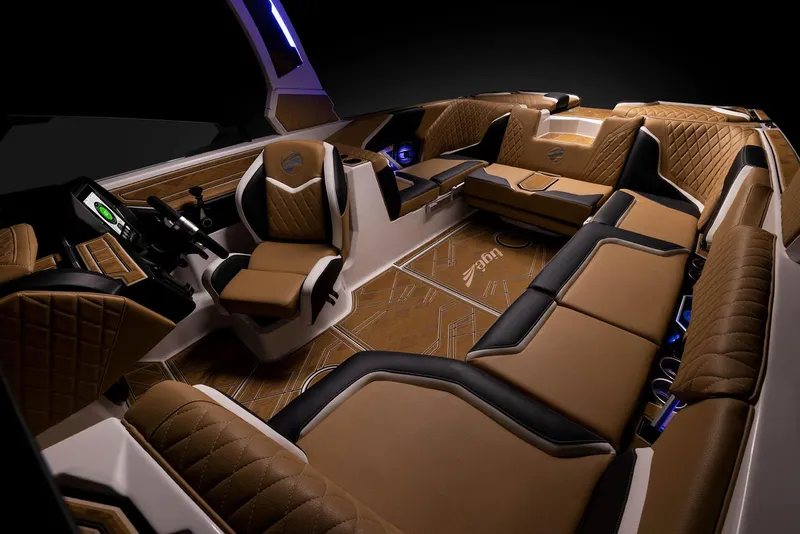 Slide: The Image of Manufacturer Provided Image: 2023 Tigé 24RZX boat interior with luxurious brown and black seating. - 17