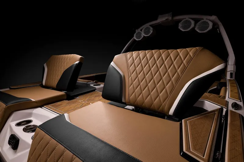 Slide: The Image of Manufacturer Provided Image: 2023 Tigé 24RZX boat interior with luxurious brown and black diamond-stitched seats. - 22