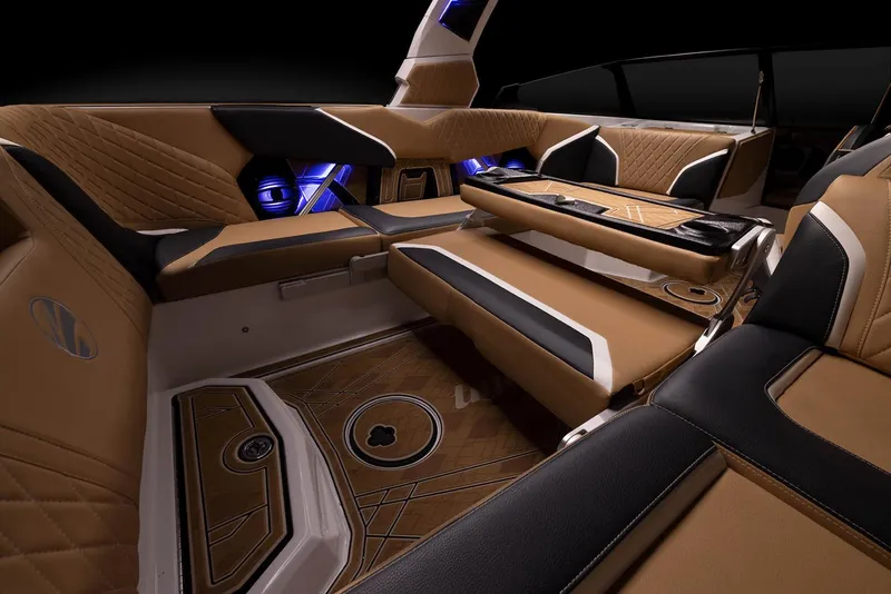 Slide: The Image of Manufacturer Provided Image: 2023 Tigé 24RZX boat interior with luxurious seating and ambient lighting. - 25