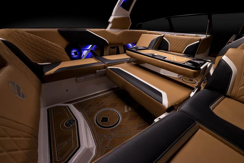 Slide: The Image of Manufacturer Provided Image: 2023 Tigé 24RZX boat interior with luxurious seating and ambient lighting. - 26