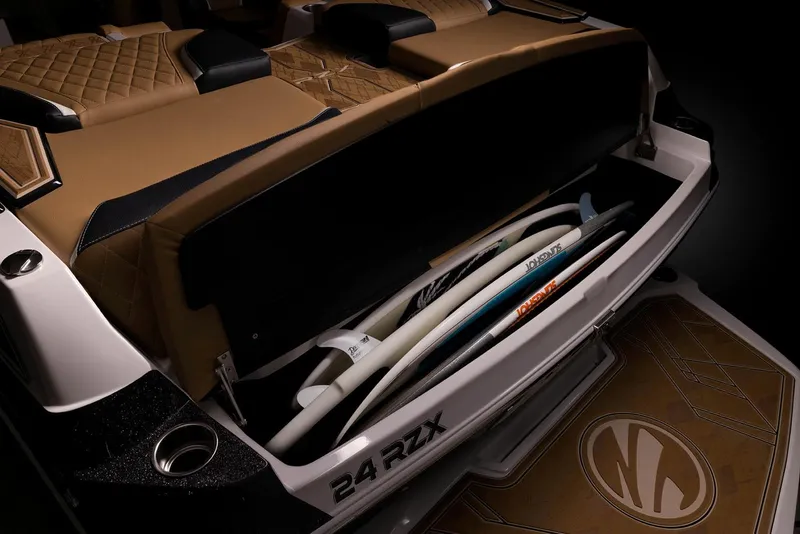 Slide: The Image of Manufacturer Provided Image: 2023 Tigé 24RZX boat with surfboard storage compartment. - 29