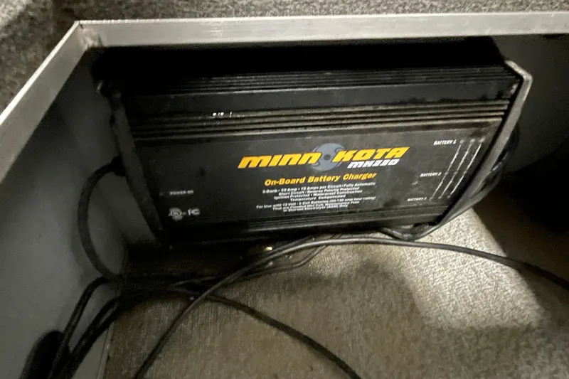 Slide: The Image of Minn Kota MK330 on-board battery charger in 2007 Lund 1900 Pro-V IFS/SE boat. - 13