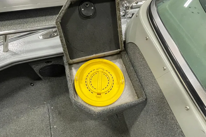 Slide: The Image of 2007 Lund 1900 Pro-V IFS/SE boat interior with yellow hatch cover. - 14