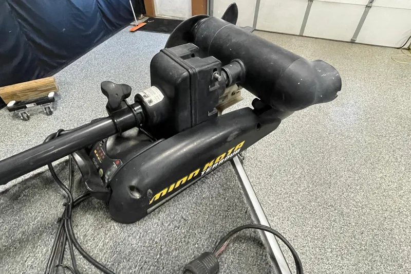 Slide: The Image of 2007 Lund 1900 Pro-V IFS/SE boat motor in a garage setting. - 8