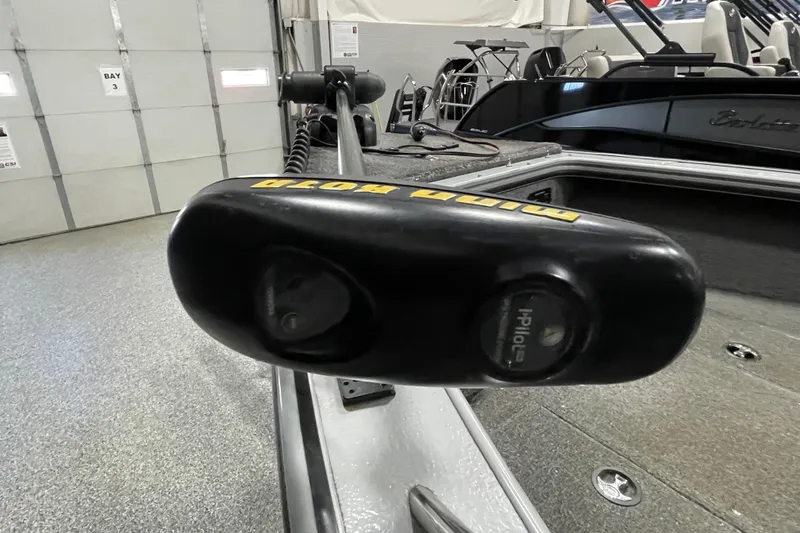 Slide: The Image of 2007 Lund 1900 Pro-V IFS/SE boat with iPilot trolling motor in a garage setting. - 9