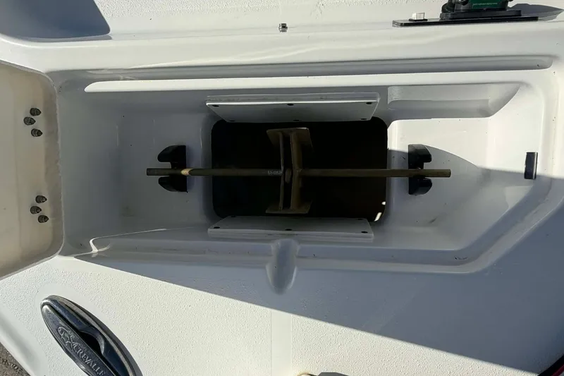 Slide: The Image of Open storage compartment on a 2016 Crevalle 26 Bay boat. - 15