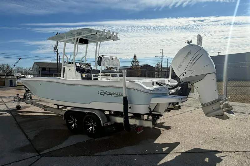 Slide: The Image of 2016 Crevalle 26 Bay boat on trailer with Mercury outboard motor. - 8