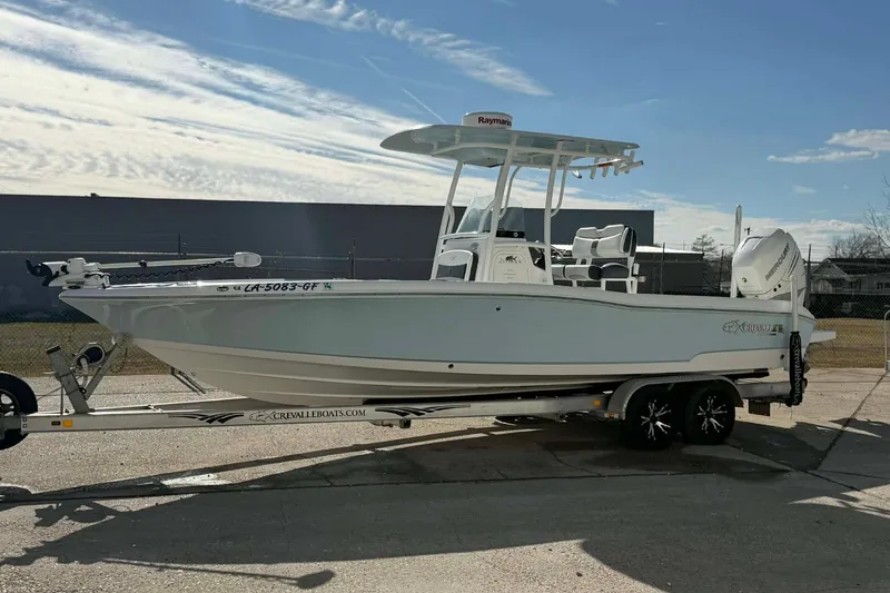 Slide: The Image of 2016 Crevalle 26 Bay boat on trailer, featuring a sleek design and modern equipment. - 9