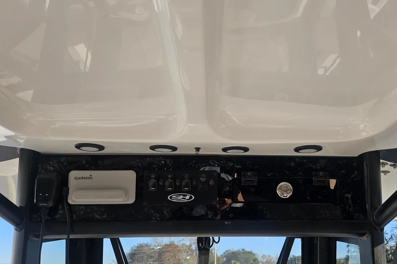 Slide: The Image of 2026 Sea Hunt BX 25 FS boat console with Garmin electronics and control panel. - 17