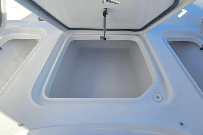 Slide: The Image of Open storage compartment on 2026 Sea Hunt BX 25 FS boat. - 25