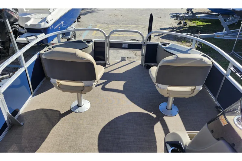 Slide: The Image of 2023 Sun Tracker Bass Buggy 18 DLX pontoon boat interior with two swivel seats. - 44