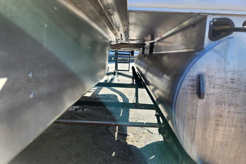 Slide: The Image of Underneath view of 2023 Sun Tracker Bass Buggy 18 DLX pontoon boat. - 9