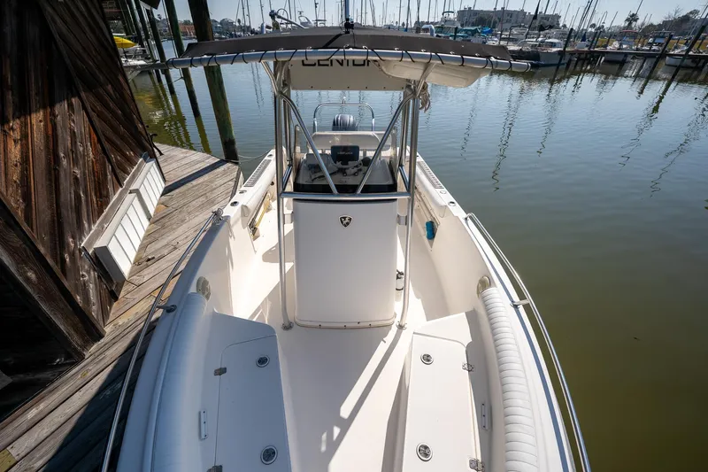 Slide: The Image of 2007 Century 2200 Center Console boat docked at marina, sunny day. - 21