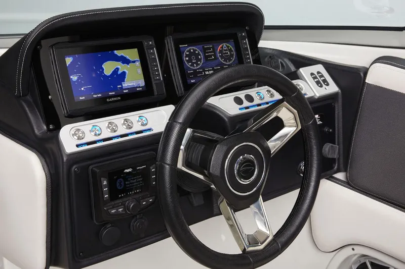 Slide: The Image of Manufacturer Provided Image: 2025 Crownline 278 SS dashboard with Garmin navigation and modern controls. - 6