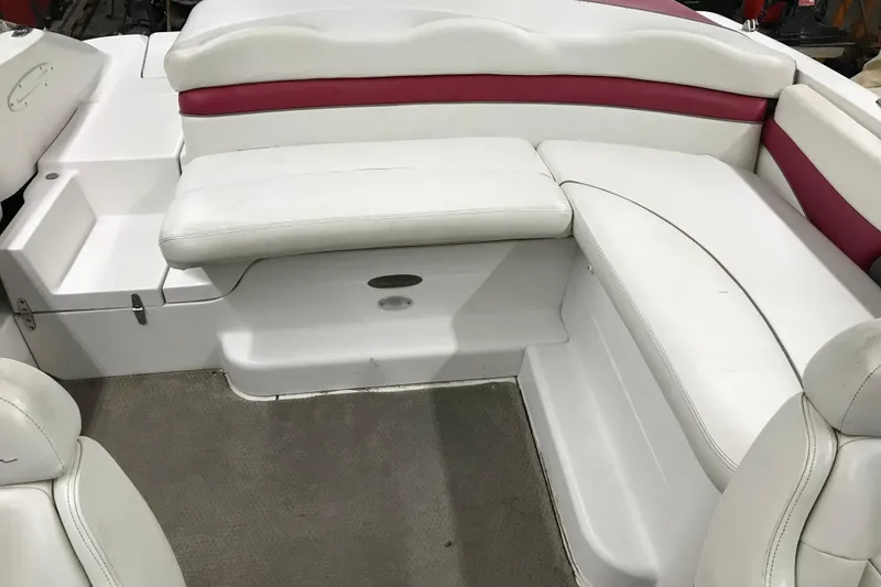 Slide: The Image of 2001 Four Winns 210 Horizon boat interior with white and red seating. - 17