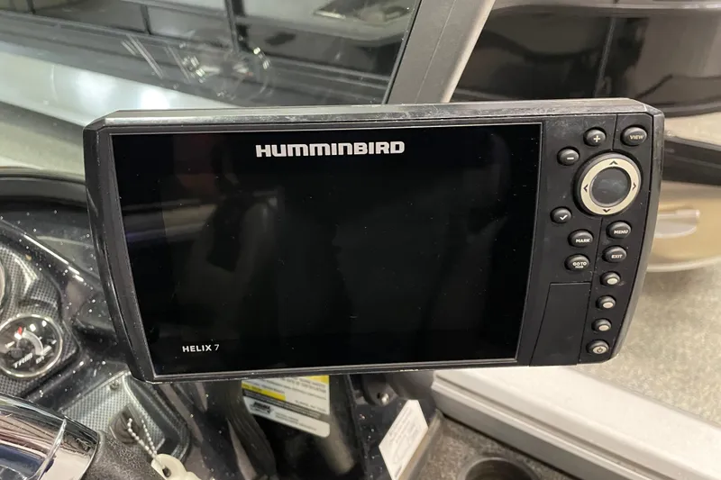 Slide: The Image of Humminbird Helix 7 fish finder on 2015 Triton 178 DV boat dashboard. - 24