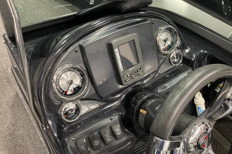 Slide: The Image of Dashboard of 2015 Triton 178 DV boat with gauges and Lowrance Elite-3x fishfinder. - 25