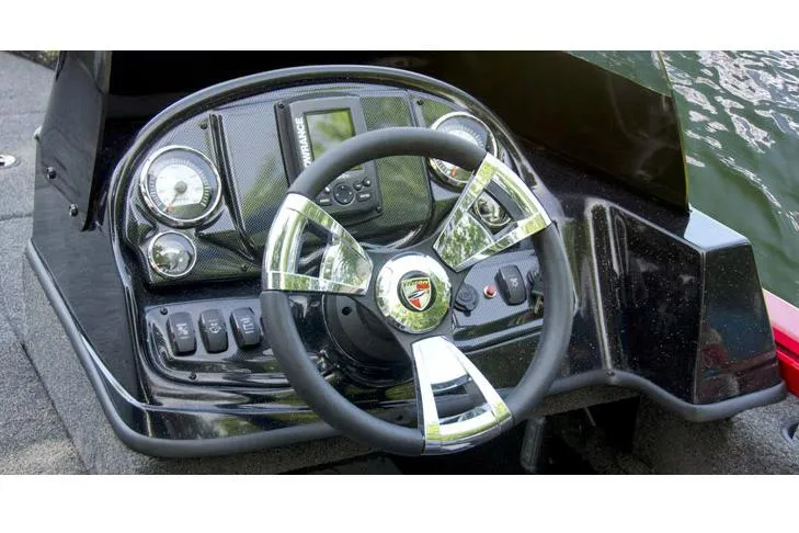 Slide: The Image of 2015 Triton 178 DV boat with Mercury engine in showroom setting. - 6