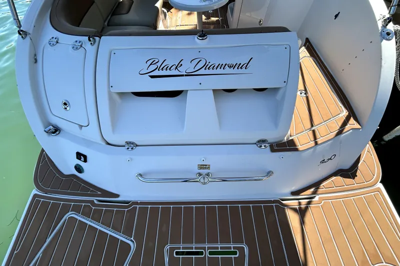 Slide: The Image of 2007 Sea Ray 260 Sundeck boat with "Black Diamond" name on deck. - 8