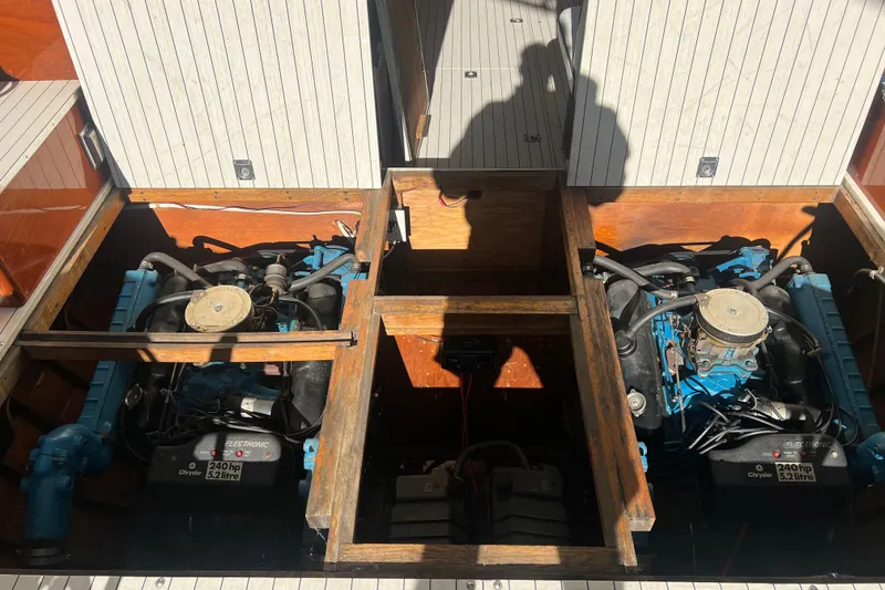 Slide: The Image of Engine compartment of a 1987 Skiff Craft 31' Runabout with dual Chrysler engines. - 11