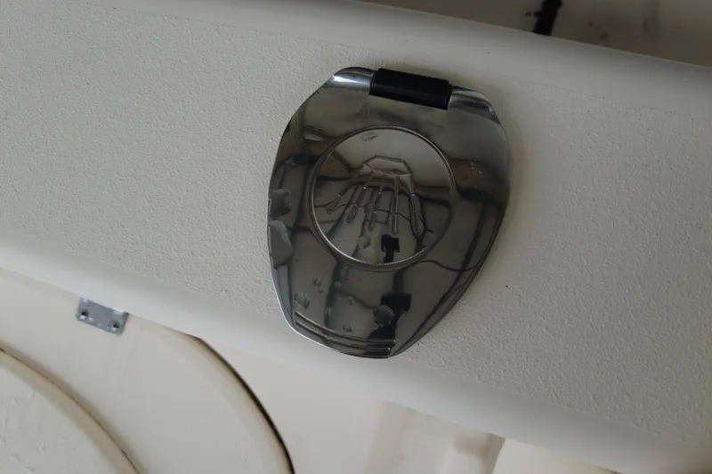 Slide: The Image of Chrome latch detail on 2016 Grady-White Seafarer 228 boat. - 12