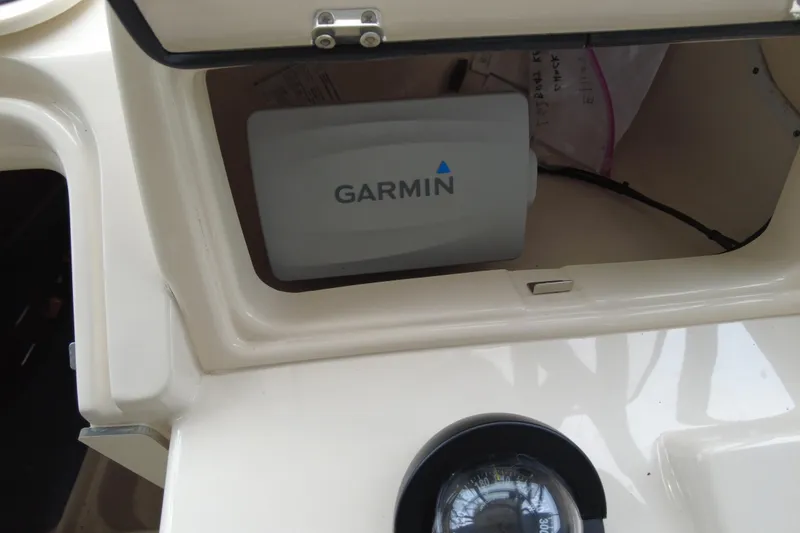 Slide: The Image of 2016 Grady-White Seafarer 228 boat with Garmin navigation system. - 5