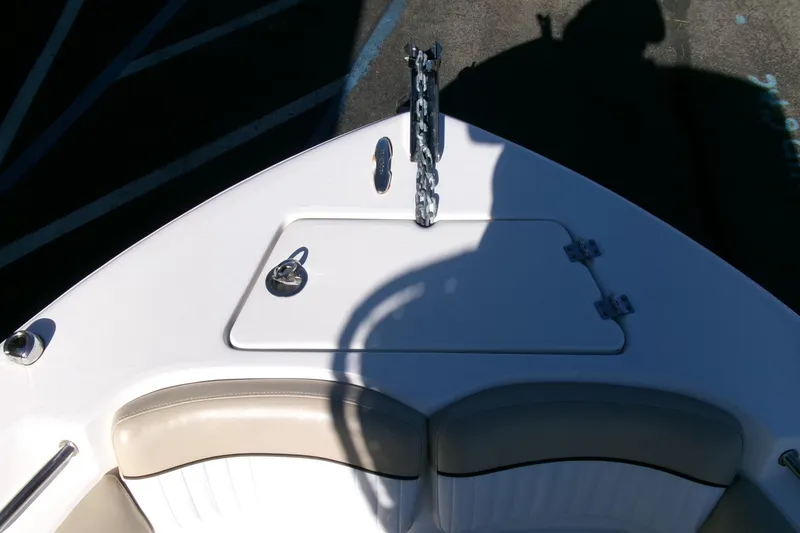Slide: The Image of 2016 Sea Fox 186 Commander boat bow with anchor chain and storage hatch. - 4