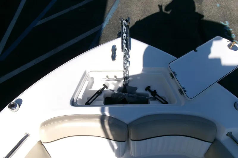 Slide: The Image of 2016 Sea Fox 186 Commander boat anchor compartment with open hatch and chain. - 5
