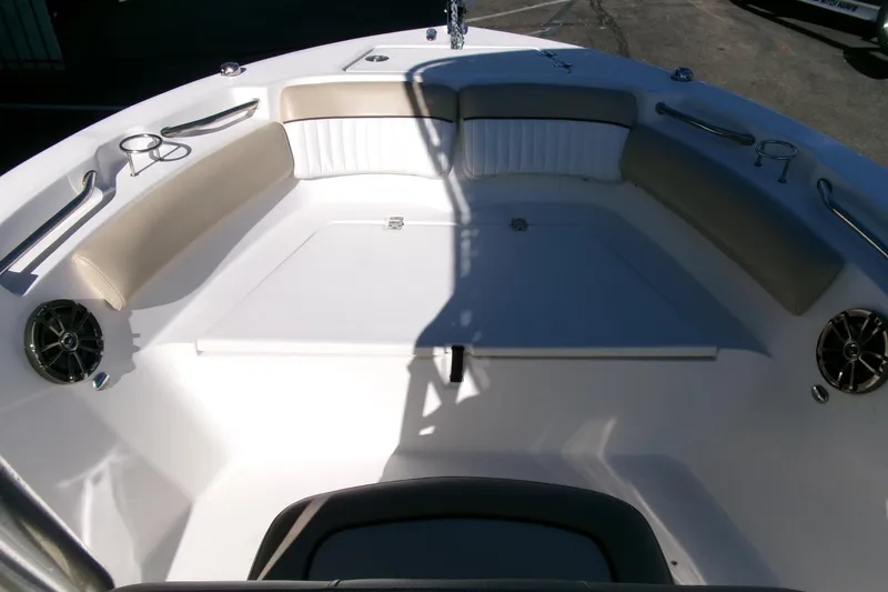 Slide: The Image of 2016 Sea Fox 186 Commander boat interior with cushioned seating and cup holders. - 6
