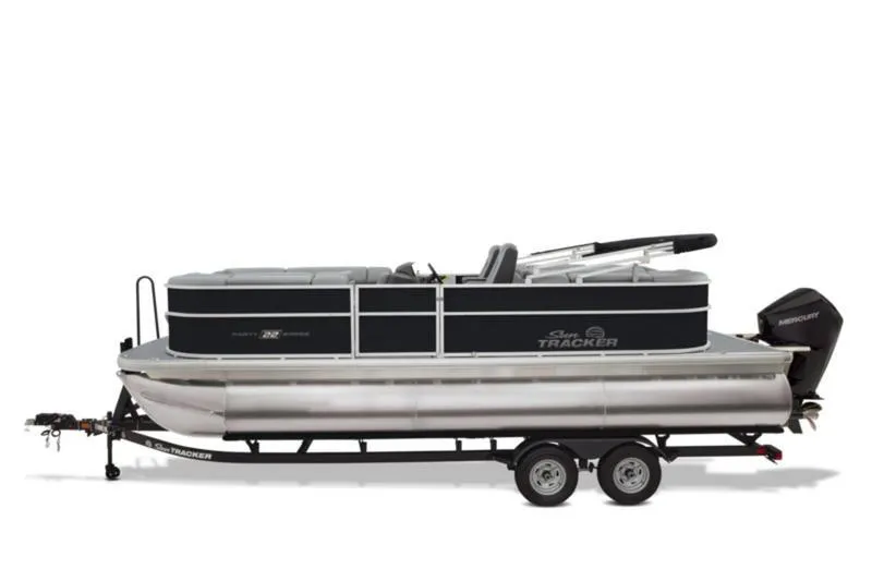 Slide: The Image of 2026 Sun Tracker Party Barge 22 DLX pontoon boat on trailer, side view. - 11