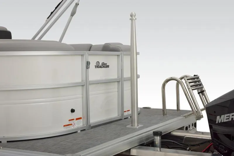 Slide: The Image of 2026 Sun Tracker Party Barge 22 DLX pontoon boat rear view with motor and ladder. - 17