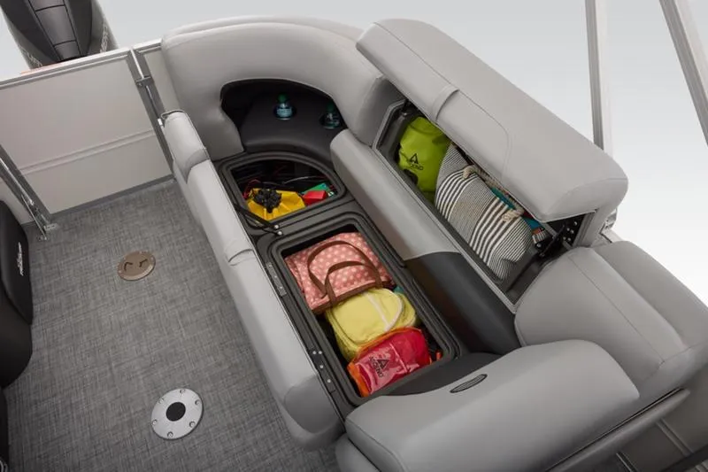 Slide: The Image of 2026 Sun Tracker Party Barge 22 DLX interior storage with bags and accessories. - 45