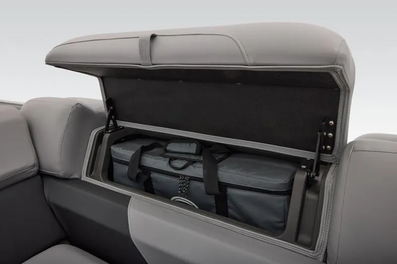 Slide: The Image of 2026 Sun Tracker Party Barge 22 DLX storage compartment with gray interior and bag. - 47